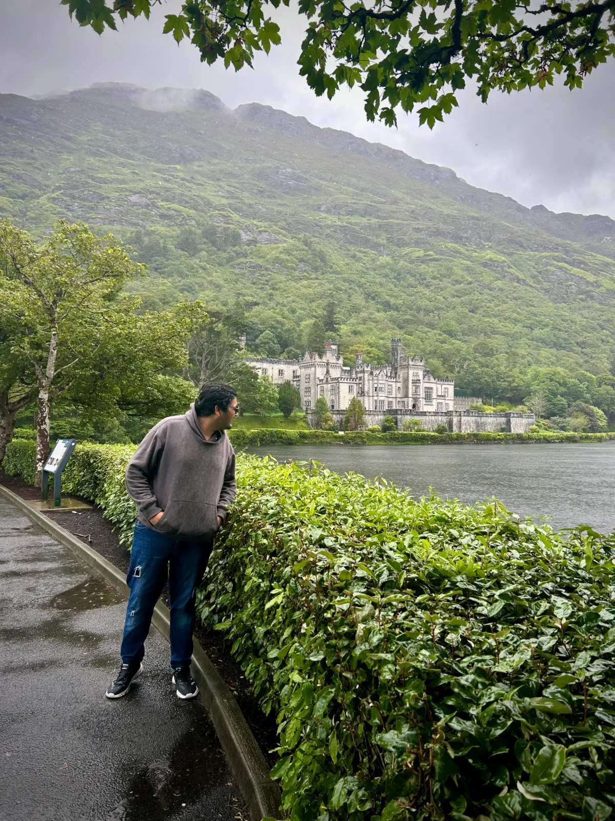 Anirudh Chugh walking beside a lake in Ireland